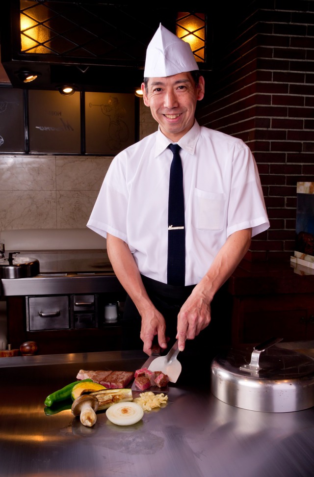 The Kobe beef certificate is displayed inside the restaurant.